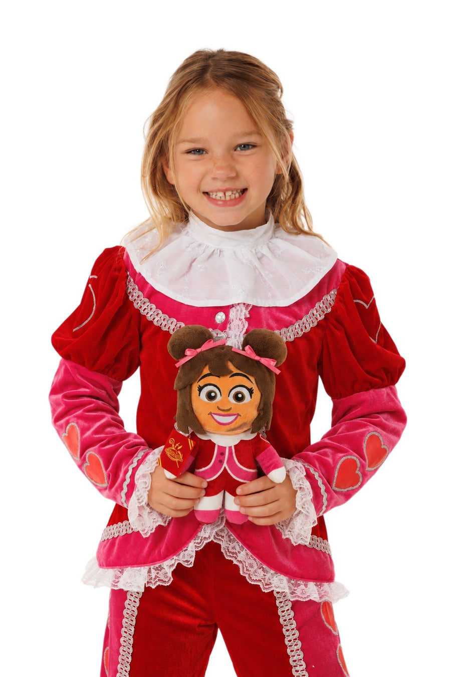 Testpiet fanset: meisje in het Testpiet verkleedkostuum houdt de Testpiet knuffel vast